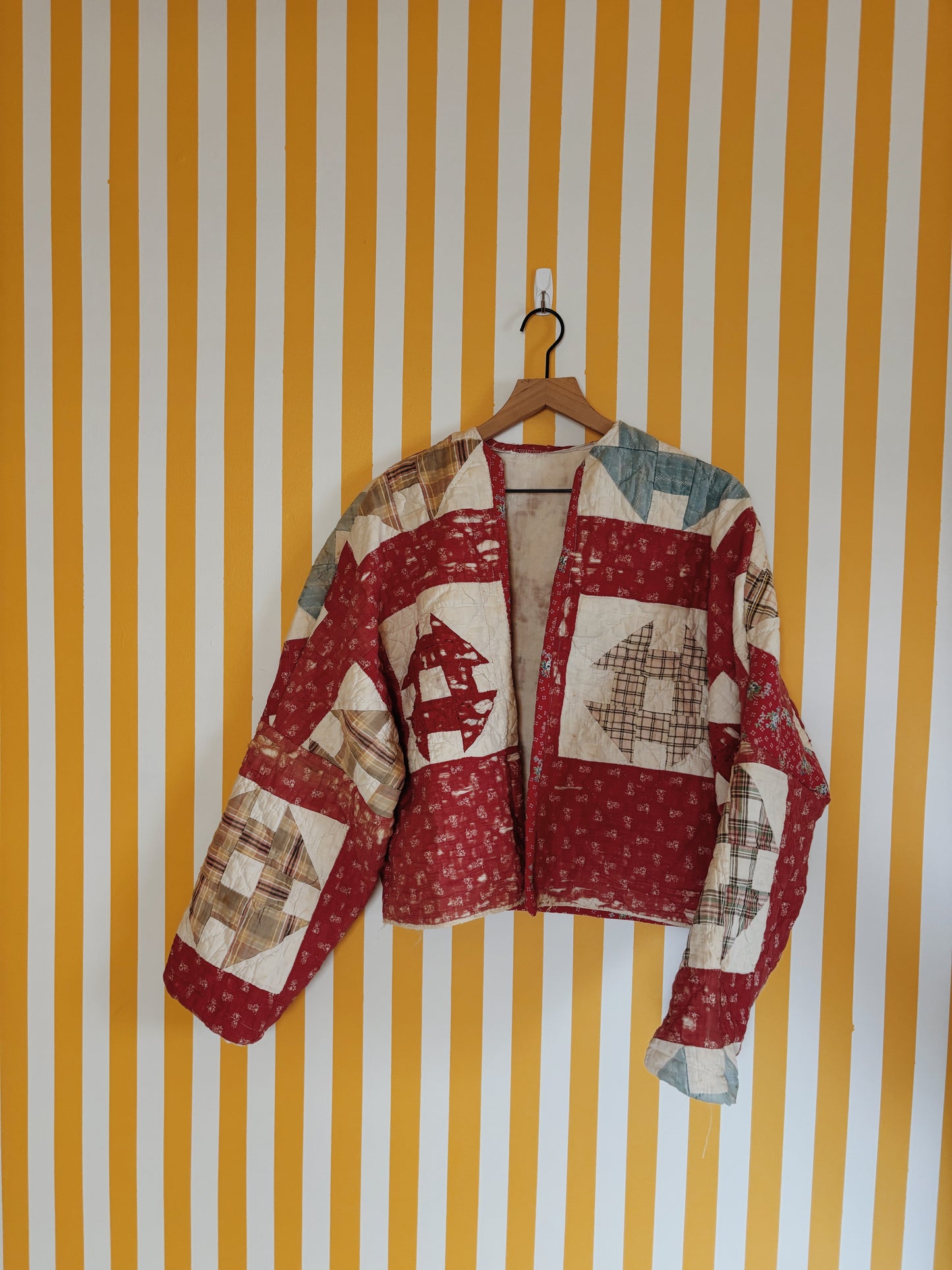 tattered red quilt coat