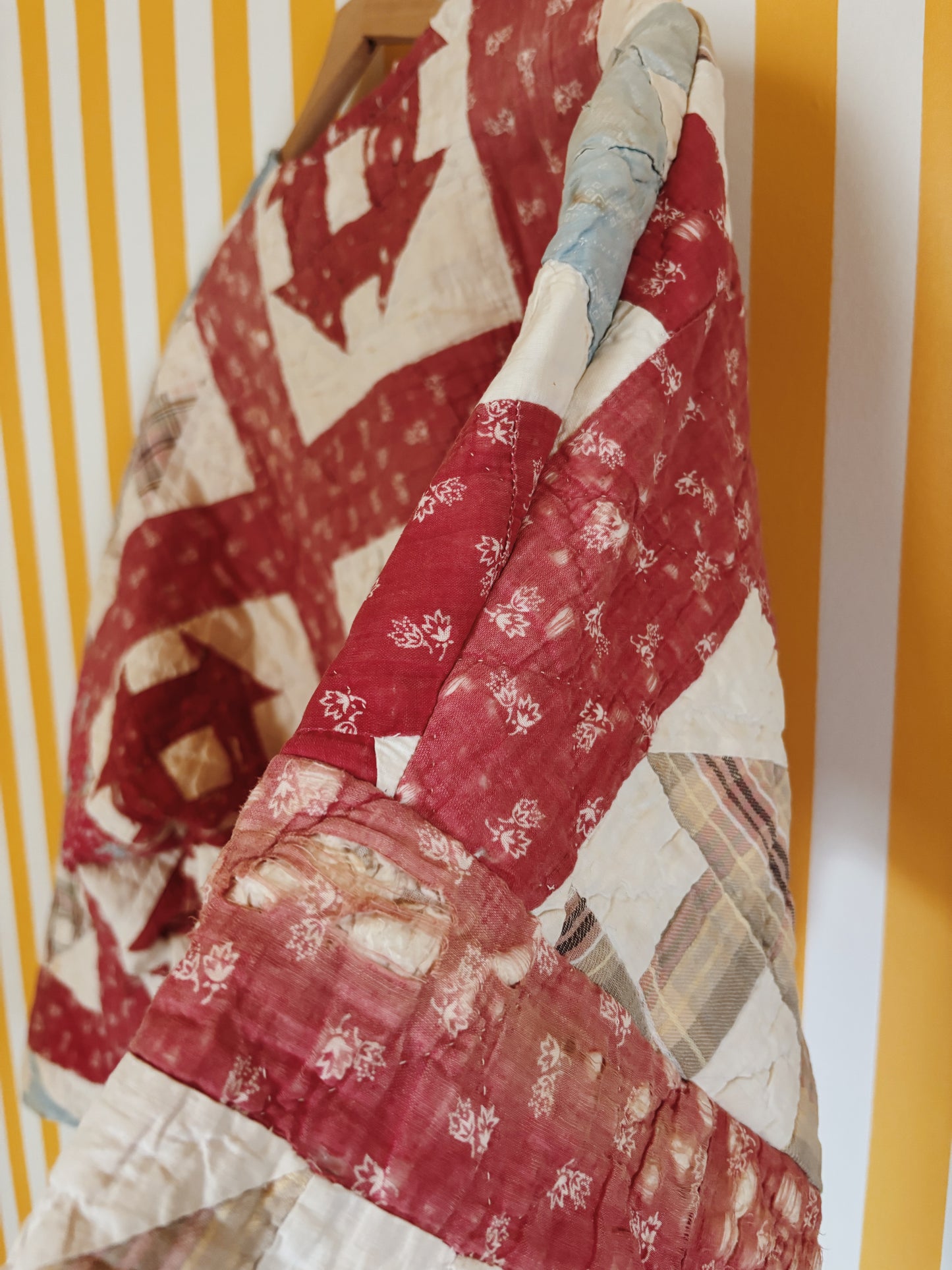 tattered red quilt coat