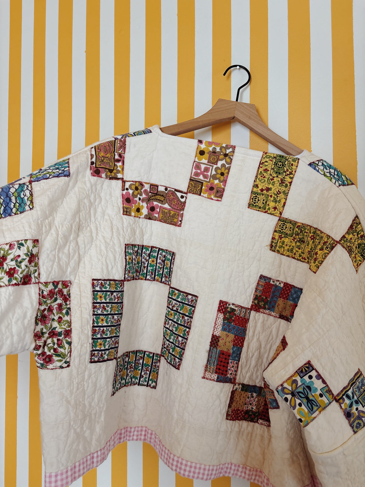 reversible geometric quilt coat